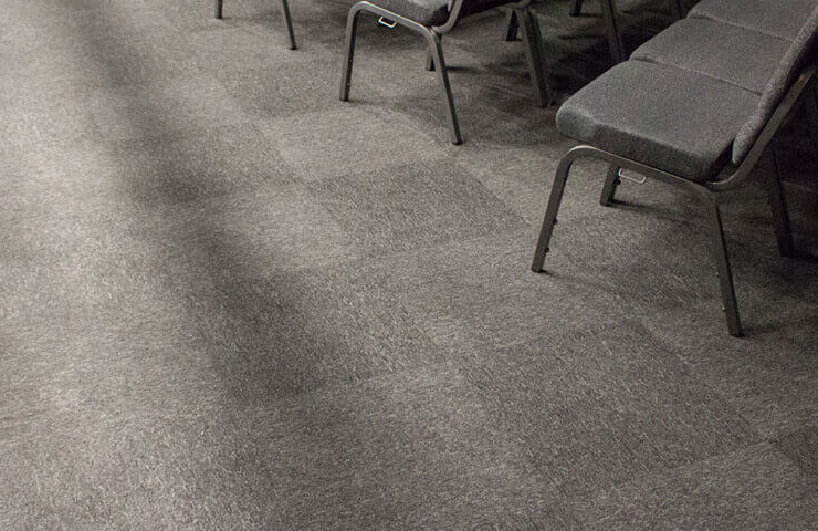 Grey commercial carpet carpet tiles in an office